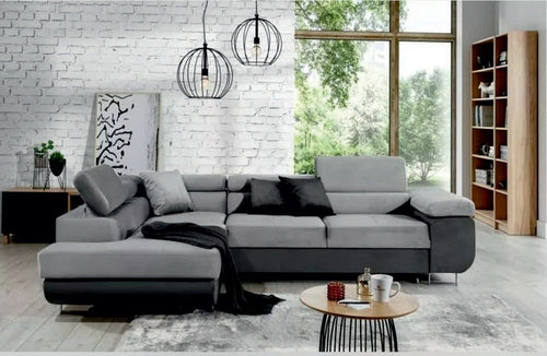 Grey fabric corner sofa bed with chaise end and adjustable headrests