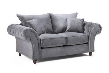 Gray sofa with cushions on a white background